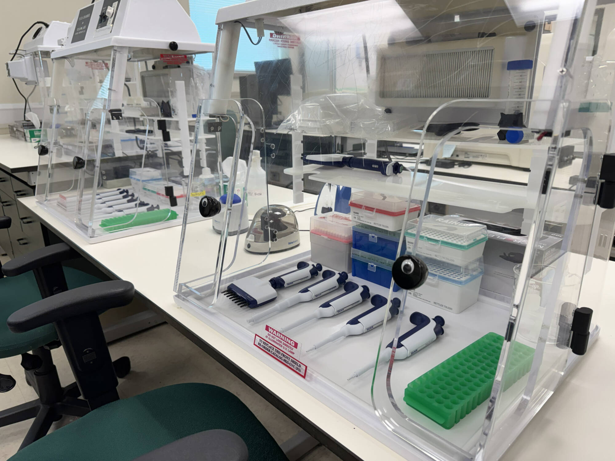 A PCR chamber for pipetting samples in a sterile environment prior to analysis.